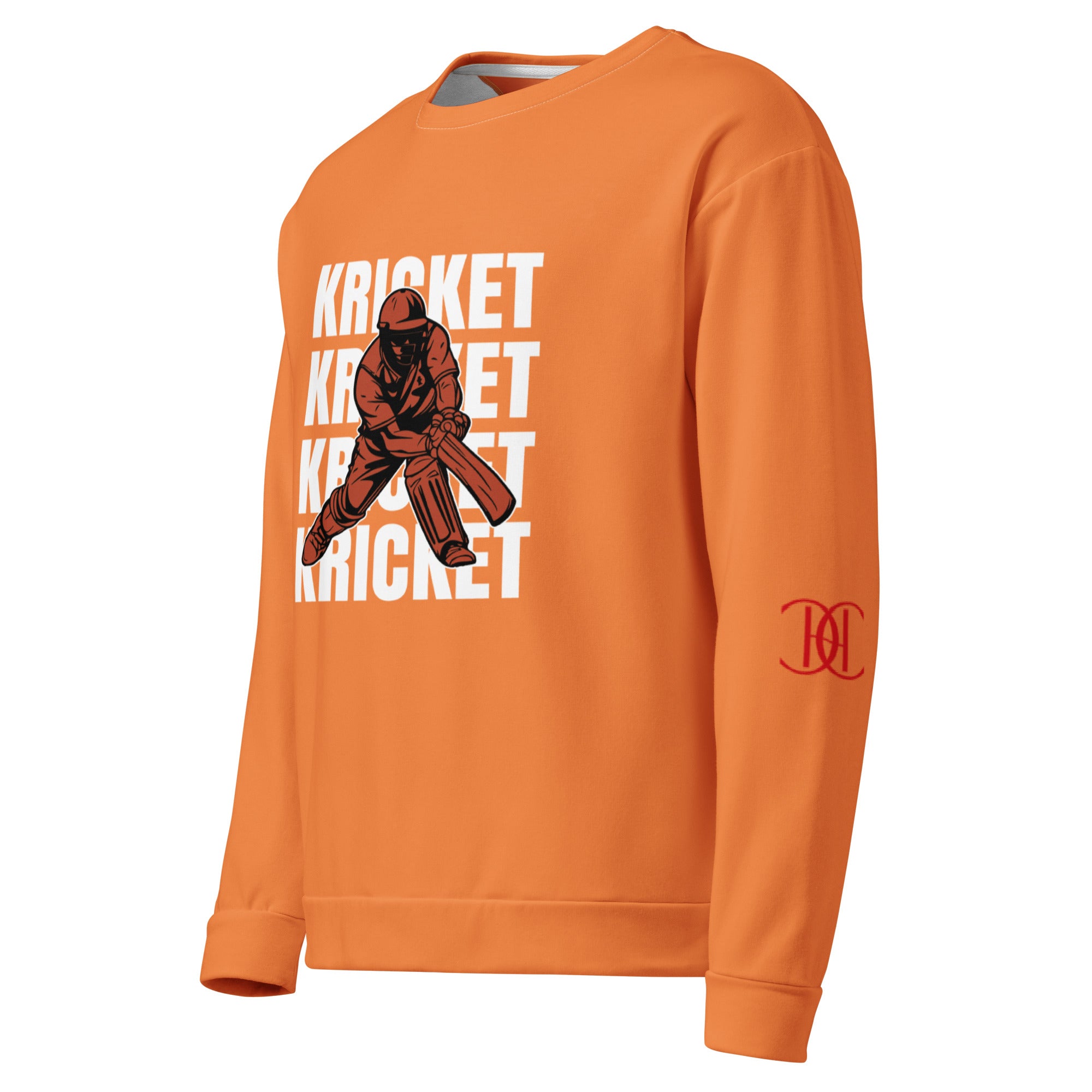 Cachy’s Urban orange sweatshirt with bold “Kricket” text repeat and cricket player graphic print