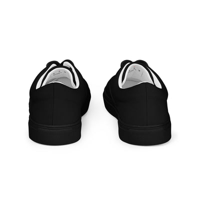 Black lace-up canvas sneakers with subtle red Cachy’s Urban logo on the tongue