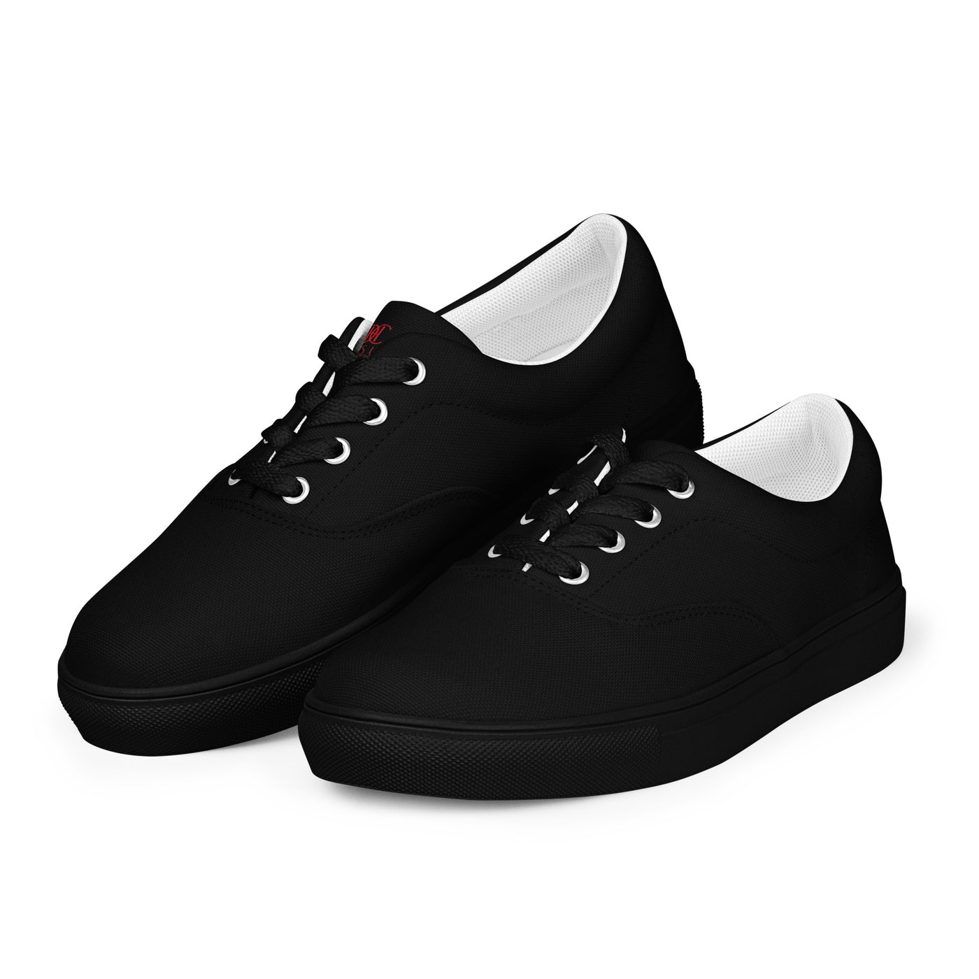 Black lace-up canvas sneakers with subtle red Cachy’s Urban logo on the tongue