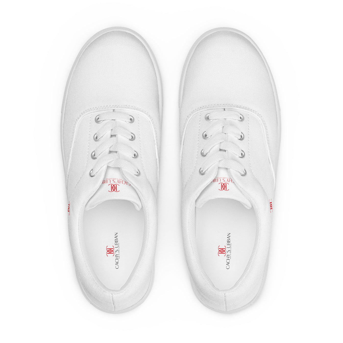 White lace-up canvas sneakers with red Cachy’s Urban logo on the side
