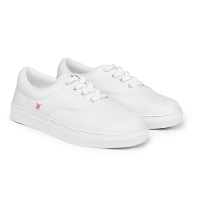 White lace-up canvas sneakers with red Cachy’s Urban logo on the side