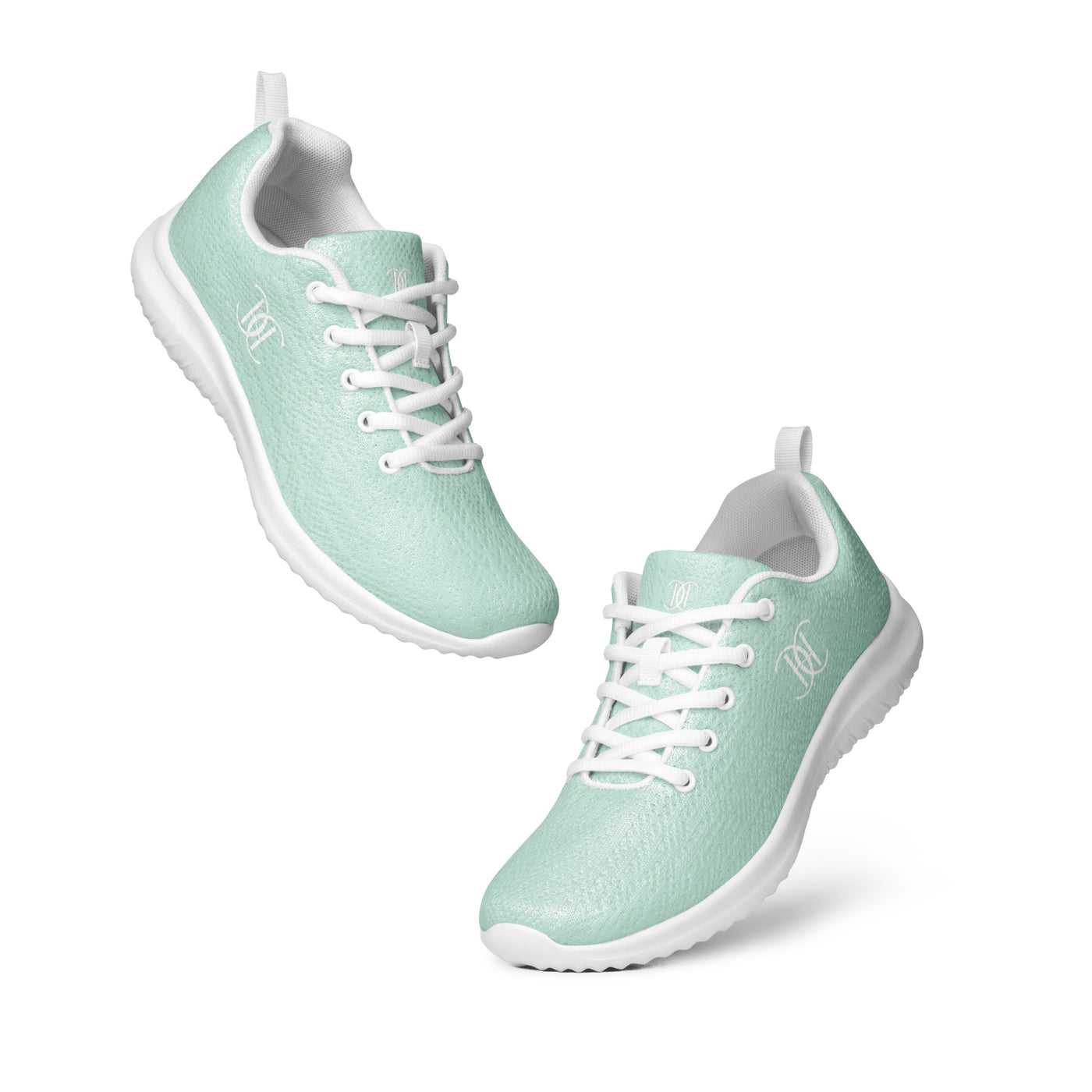 Mint green athletic sneakers with white soles, white laces, and white Cachy’s Urban logo on the side