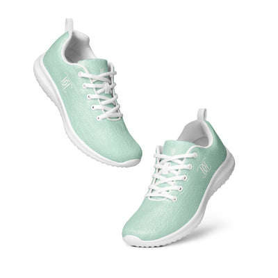 Mint green athletic sneakers with white soles, white laces, and white Cachy’s Urban logo on the side
