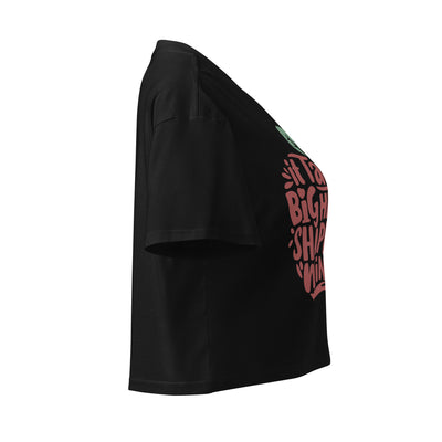 Cachy’s Urban cropped t-shirt with “It Takes a Big Heart to Shape Little Minds” apple graphic print, available in multiple colours