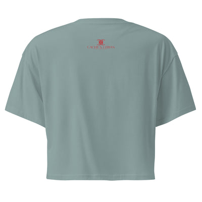 Cachy’s Urban cropped t-shirt with “It Takes a Big Heart to Shape Little Minds” apple graphic print, available in multiple colours