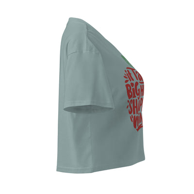 Cachy’s Urban cropped t-shirt with “It Takes a Big Heart to Shape Little Minds” apple graphic print, available in multiple colours