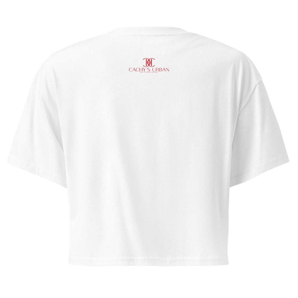 Cachy’s Urban cropped t-shirt with “It Takes a Big Heart to Shape Little Minds” apple graphic print, available in multiple colours