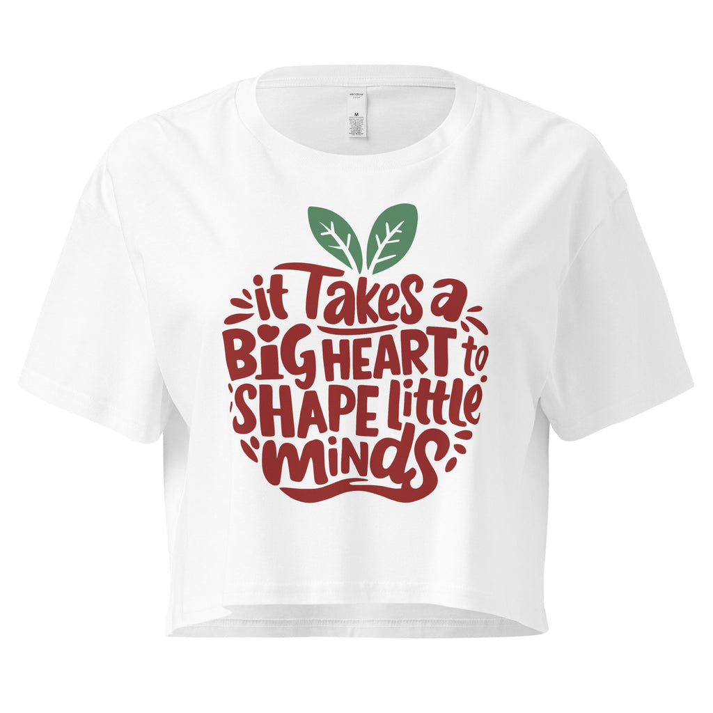 Cachy’s Urban cropped t-shirt with “It Takes a Big Heart to Shape Little Minds” apple graphic print, available in multiple colours