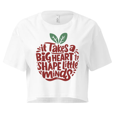 Cachy’s Urban cropped t-shirt with “It Takes a Big Heart to Shape Little Minds” apple graphic print, available in multiple colours