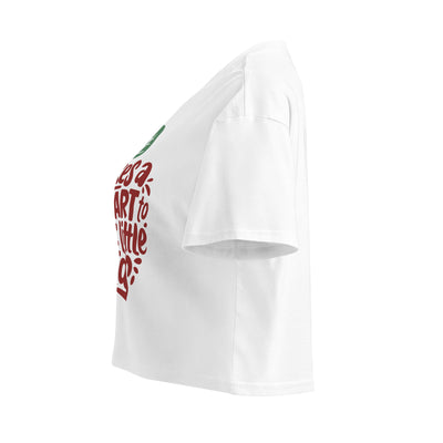 Cachy’s Urban cropped t-shirt with “It Takes a Big Heart to Shape Little Minds” apple graphic print, available in multiple colours