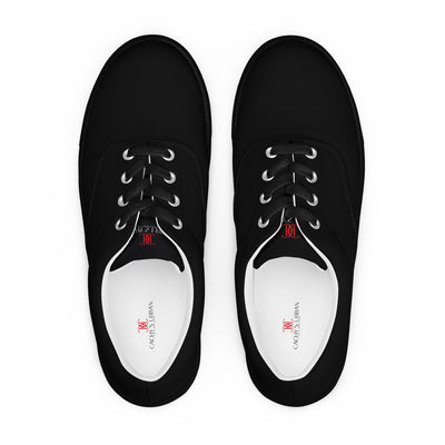 All-black lace-up canvas sneakers with subtle red Cachy’s Urban branding on the tongue and white inner lining