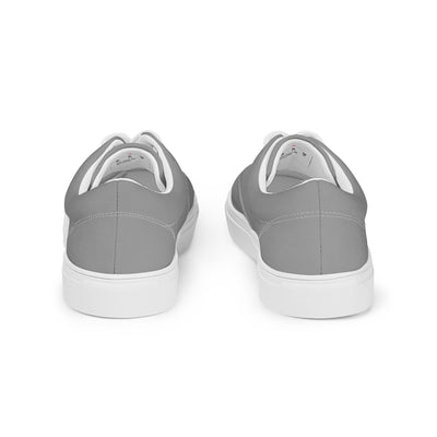 Grey lace-up canvas sneakers with white laces, white soles, and Cachy’s Urban branded insoles
