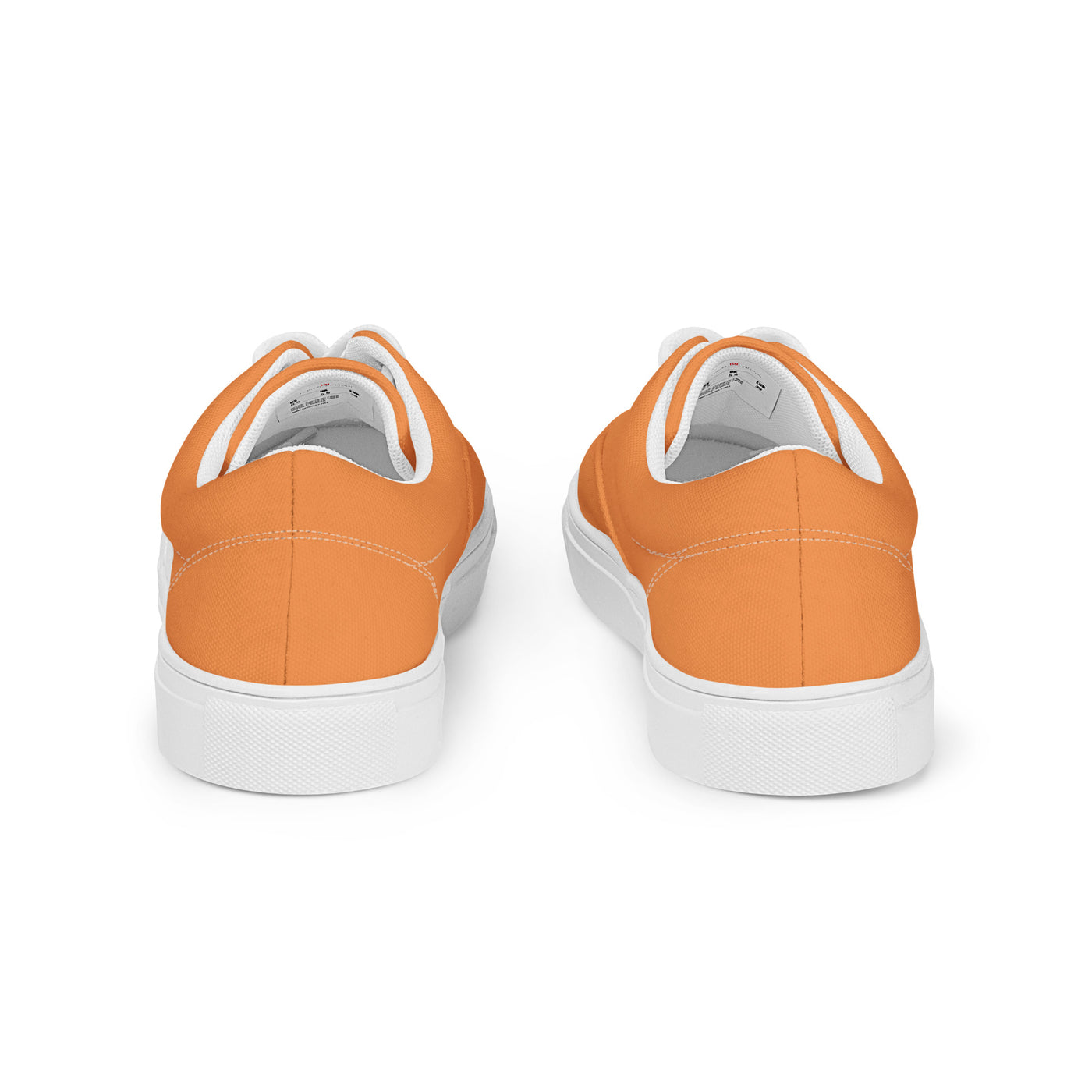 Orange lace-up canvas sneakers with white laces, white soles, and Cachy’s Urban branded insoles