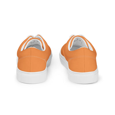 Orange lace-up canvas sneakers with white laces, white soles, and Cachy’s Urban branded insoles