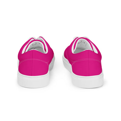 Bright pink lace-up canvas sneakers with white laces, white soles, and Cachy’s Urban branded insoles