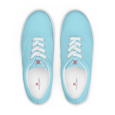 Sky Blue lace-up canvas sneakers with white laces, white soles, and Cachy’s Urban branded insoles