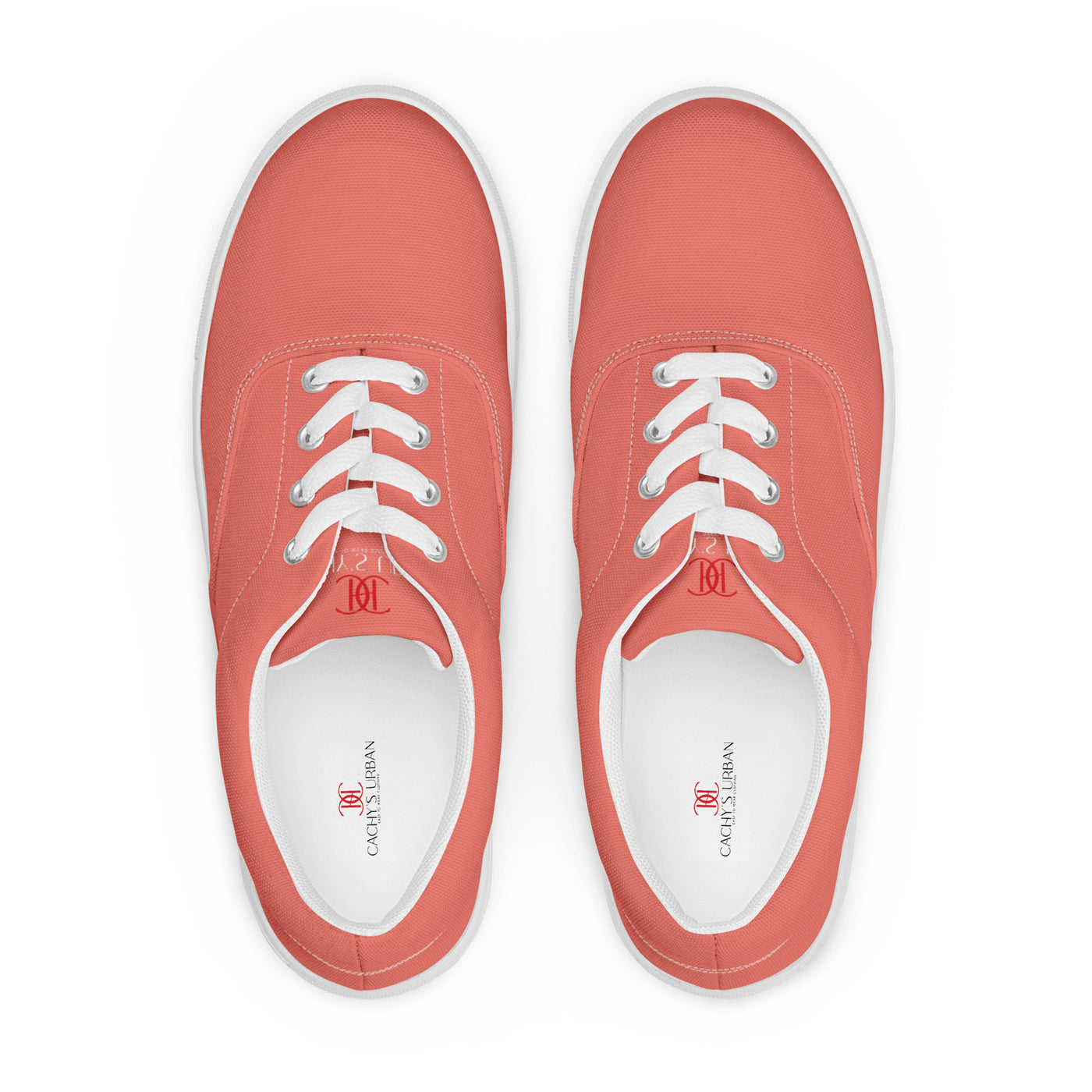Salmon lace-up canvas sneakers with white laces, white soles, and Cachy’s Urban branded insoles