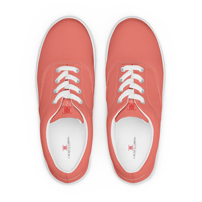 Salmon lace-up canvas sneakers with white laces, white soles, and Cachy’s Urban branded insoles