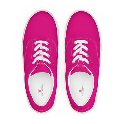 Bright pink lace-up canvas sneakers with white laces, white soles, and Cachy’s Urban branded insoles
