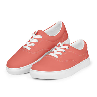 Salmon lace-up canvas sneakers with white laces, white soles, and Cachy’s Urban branded insoles
