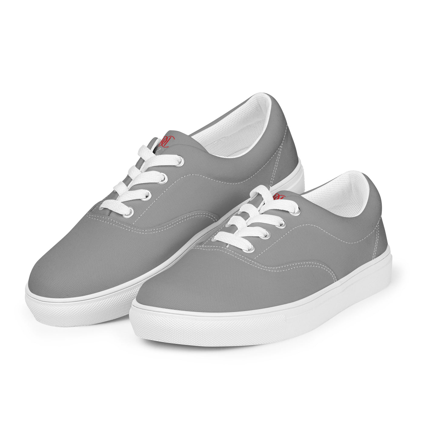 Grey lace-up canvas sneakers with white laces, white soles, and Cachy’s Urban branded insoles