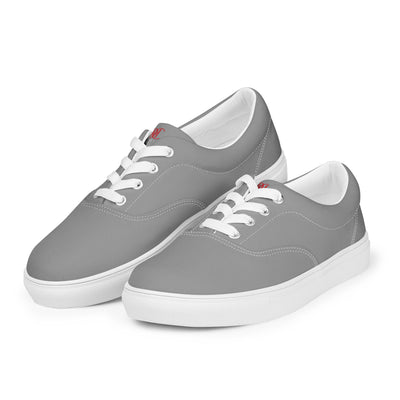 Grey lace-up canvas sneakers with white laces, white soles, and Cachy’s Urban branded insoles