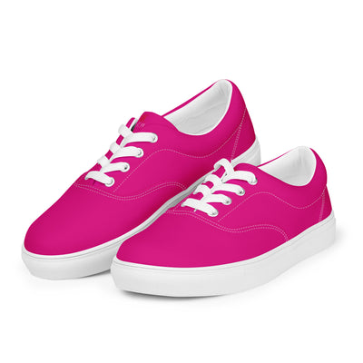 Bright pink lace-up canvas sneakers with white laces, white soles, and Cachy’s Urban branded insoles