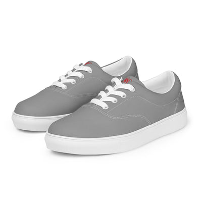 Grey lace-up canvas sneakers with white laces, white soles, and Cachy’s Urban branded insoles