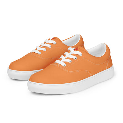 Orange lace-up canvas sneakers with white laces, white soles, and Cachy’s Urban branded insoles