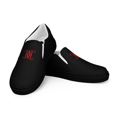 Cachy’s Urban black slip-on canvas shoes with minimalist red logo design and streetwear aesthetic