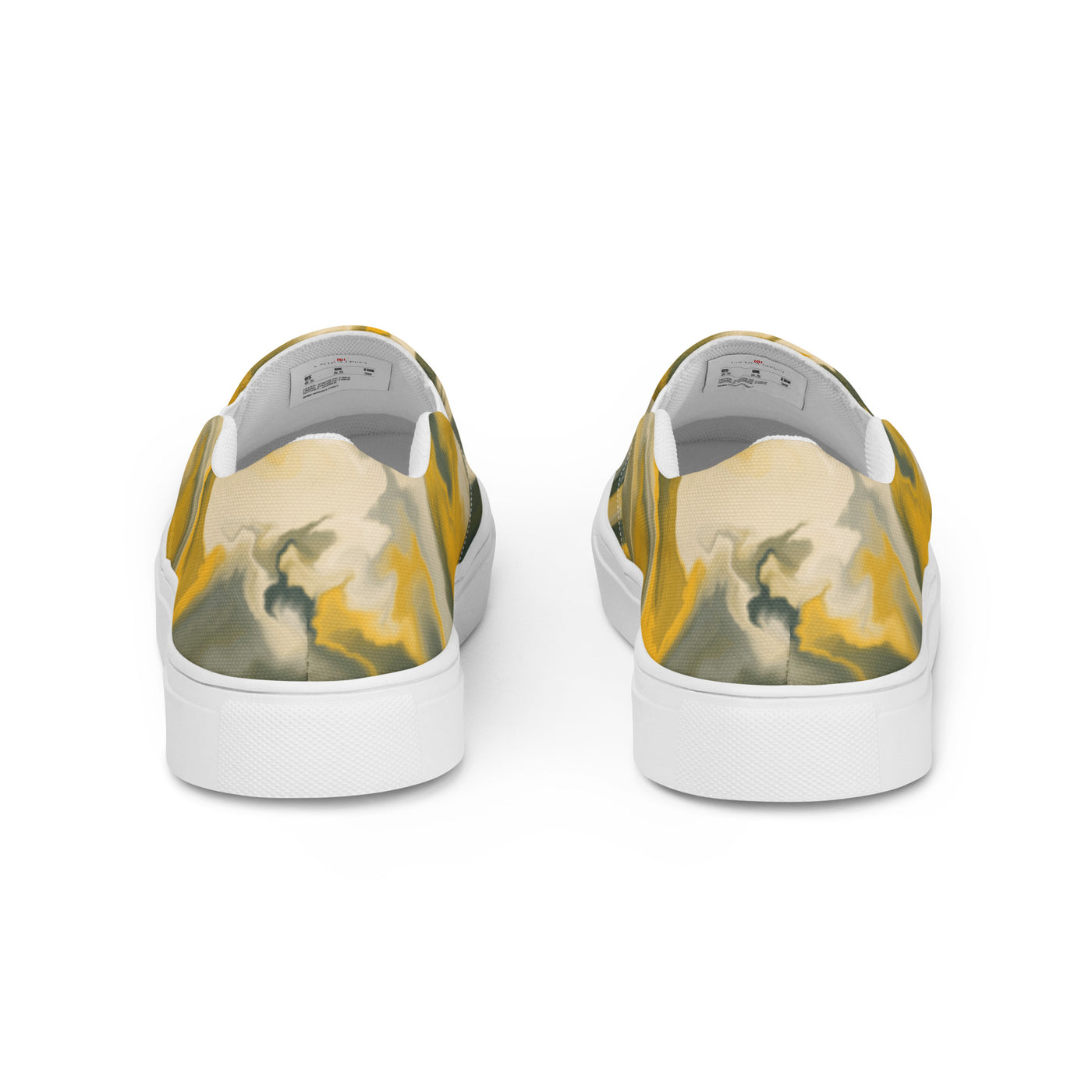 Slip-on canvas shoes with abstract camouflage pattern in yellow, green, and gray tones, featuring Cachy’s Urban branding on the insoles