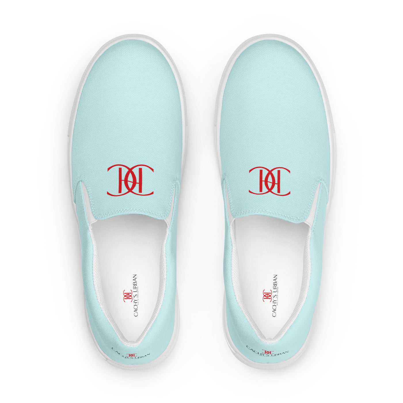 Light blue slip-on canvas shoes with red Cachy’s Urban monogram logo on the upper front and branded insoles