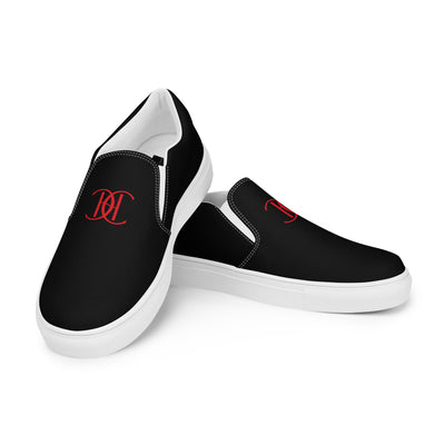 Cachy’s Urban black slip-on canvas shoes with minimalist red logo design and streetwear aesthetic
