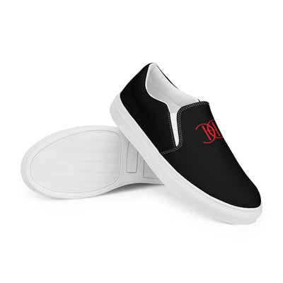 Cachy’s Urban black slip-on canvas shoes with minimalist red logo design and streetwear aesthetic